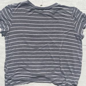 Gray white-striped shirt with small tie in front